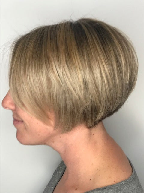 Chin length blow drying with a small rounds styling brush 